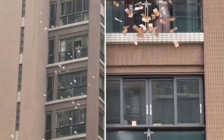 Pəncərədən küçəyə 1 milyon atdı – VİDEO